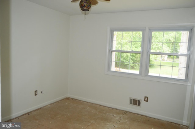 8814 Lafayette Dr, Owings, MD 20736 - unfurnished room with baseboards, plenty of natural light, and a ceiling fan