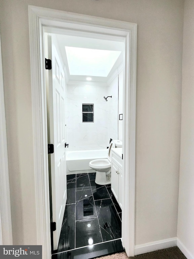 full bathroom with toilet, bathtub / shower combination, baseboards, marble finish floor, and vanity