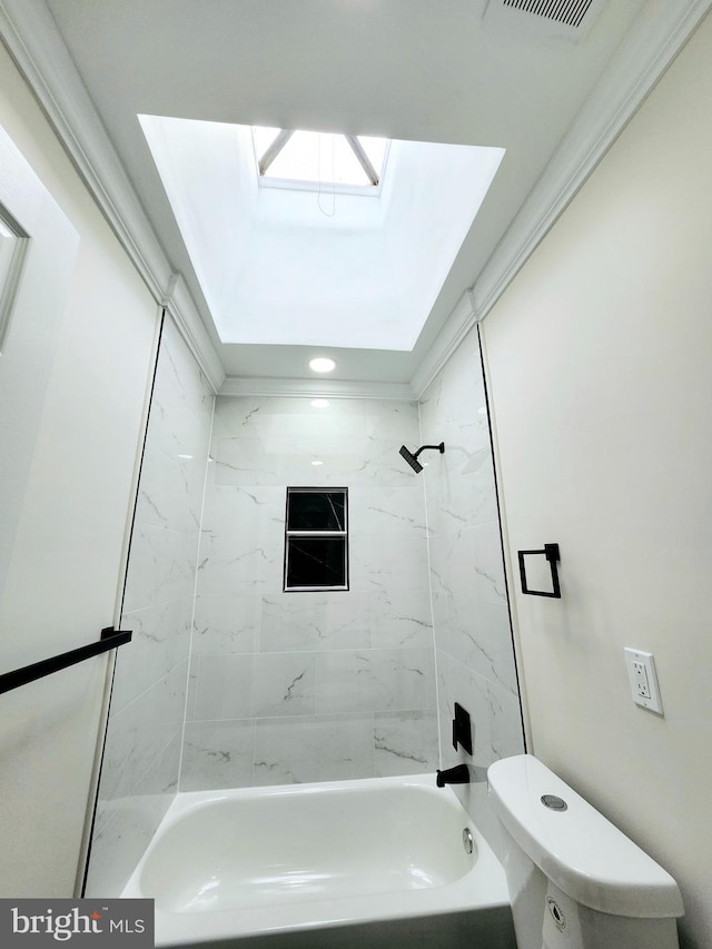 bathroom with toilet, shower / tub combination, visible vents, and a skylight
