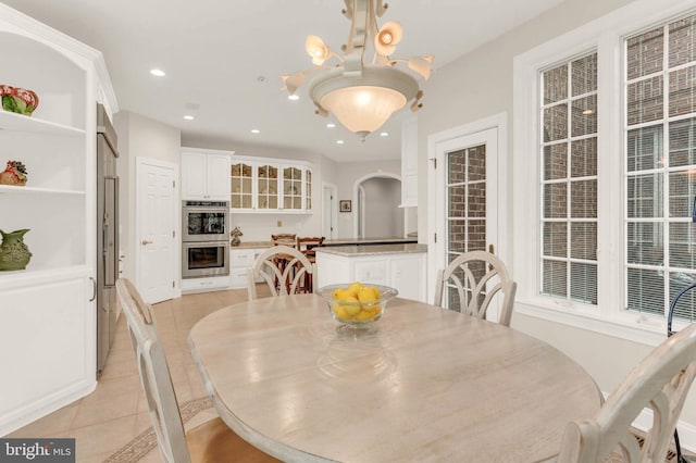 13457 Charolais Ct, Highland, MD 20777 - dining space with light tile patterned floors, recessed lighting, and a chandelier