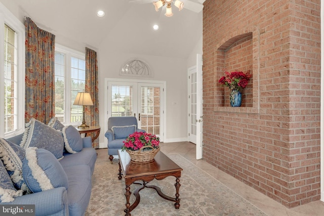 13457 Charolais Ct, Highland, MD 20777 - tiled living room featuring ceiling fan, recessed lighting, high vaulted ceiling, and french doors
