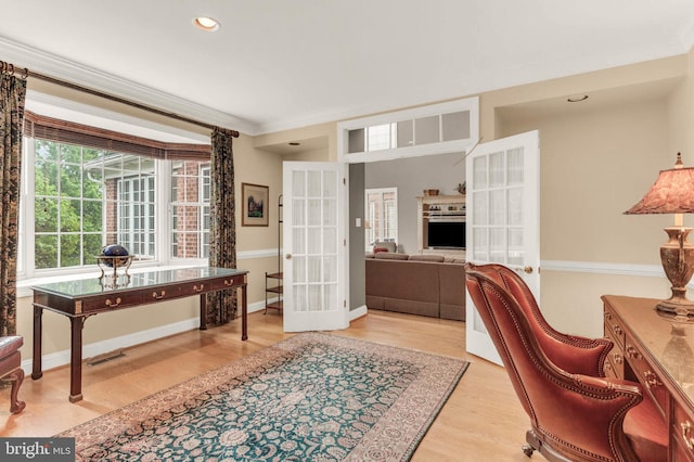 13457 Charolais Ct, Highland, MD 20777 - home office featuring french doors, ornamental molding, wood finished floors, recessed lighting, and baseboards