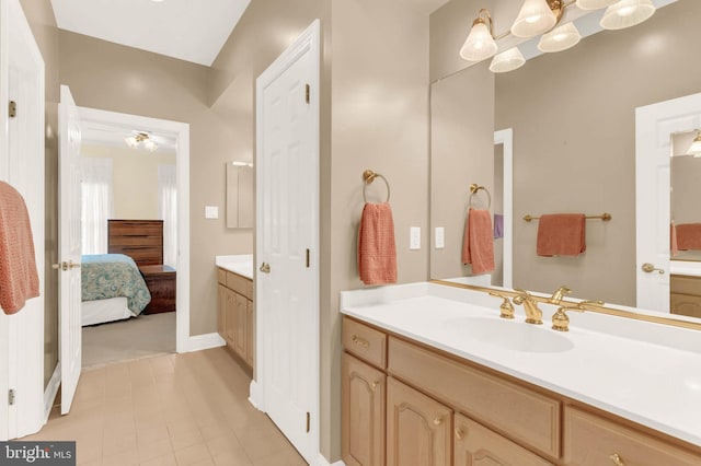 13457 Charolais Ct, Highland, MD 20777 - ensuite bathroom featuring vanity and baseboards