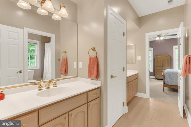 13457 Charolais Ct, Highland, MD 20777 - full bathroom with vanity, baseboards, tile patterned floors, ensuite bath, and ceiling fan