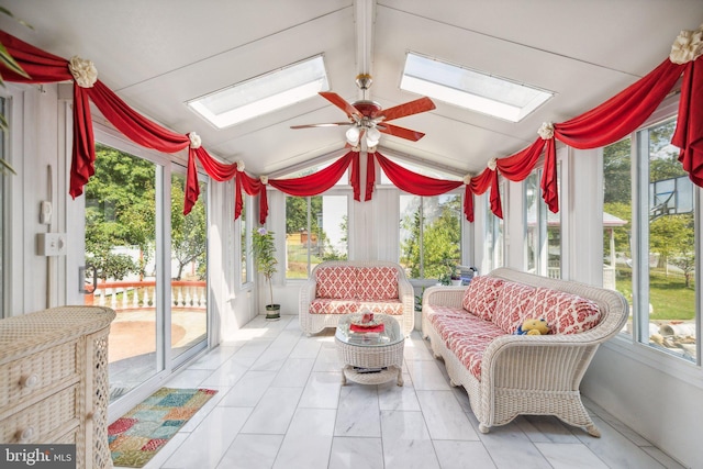 sunroom / solarium featuring a ceiling fan, an outdoor hangout area, and a skylight