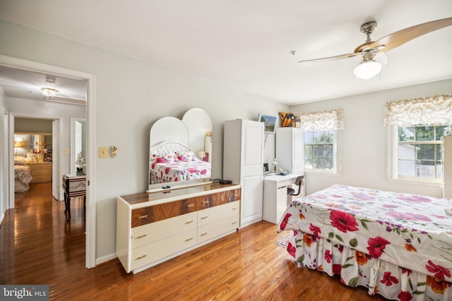 bedroom featuring ceiling fan and light wood-style flooring