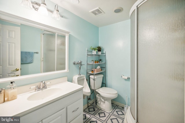 bathroom with a stall shower, toilet, vanity, and visible vents