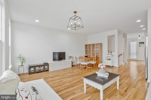 42248 Lancaster Woods Sq, Chantilly, VA 20152 - living area with light wood-style flooring, recessed lighting, a chandelier, and baseboards