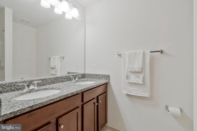 42248 Lancaster Woods Sq, Chantilly, VA 20152 - bathroom featuring double vanity and tile patterned floors