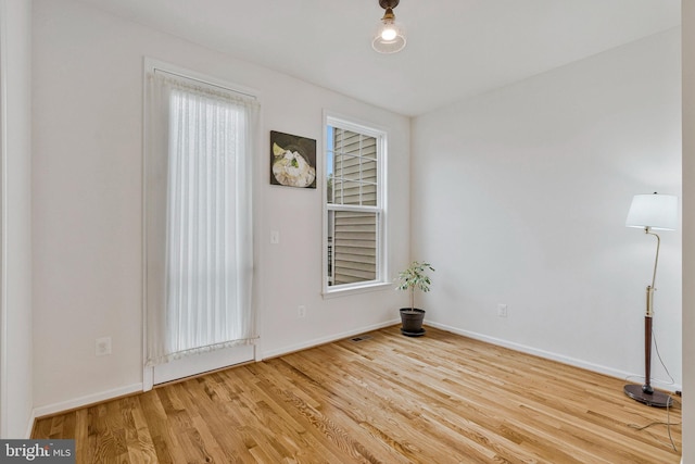42248 Lancaster Woods Sq, Chantilly, VA 20152 - unfurnished room with wood finished floors and baseboards