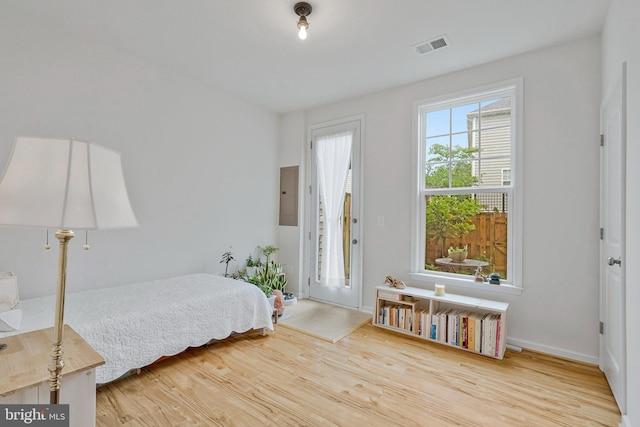 42248 Lancaster Woods Sq, Chantilly, VA 20152 - bedroom with wood finished floors, electric panel, and baseboards