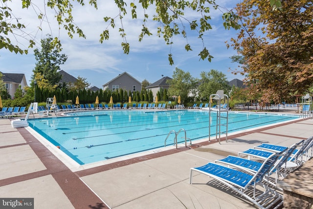 42248 Lancaster Woods Sq, Chantilly, VA 20152 - community pool featuring a patio, a water slide, and fence