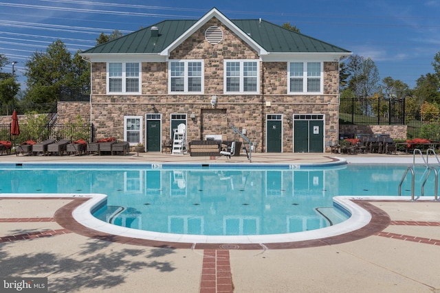 42248 Lancaster Woods Sq, Chantilly, VA 20152 - community pool featuring fence, a patio area, and outdoor lounge area