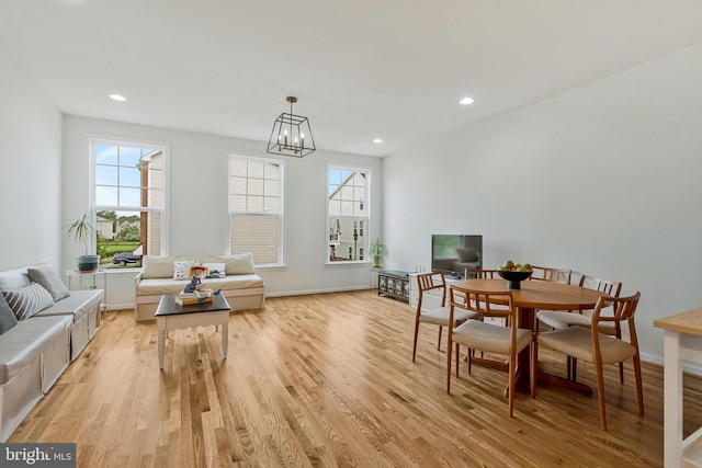 42248 Lancaster Woods Sq, Chantilly, VA 20152 - living room featuring plenty of natural light, light wood-style floors, a chandelier, baseboards, and recessed lighting