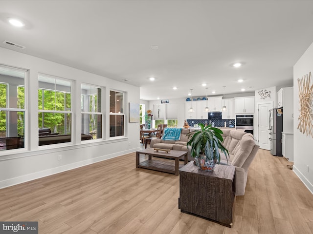 32019 Carlisle Ct, Frankford, DE 19945 - living area with baseboards, light wood finished floors, and recessed lighting