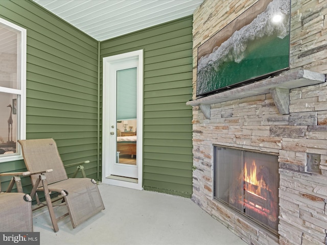 32019 Carlisle Ct, Frankford, DE 19945 - view of patio with an outdoor stone fireplace