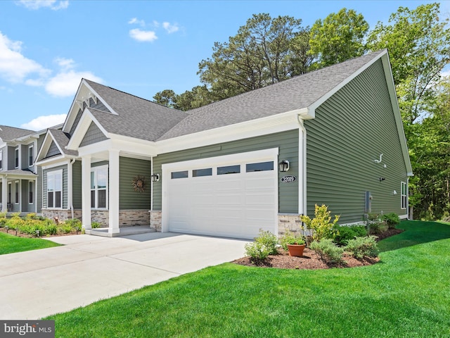 32019 Carlisle Ct, Frankford, DE 19945 - view of front of house featuring an attached garage, a front yard, driveway, and a shingled roof