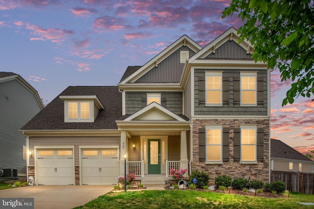 craftsman-style home with stone siding, a garage, fence, central AC unit, and a porch
