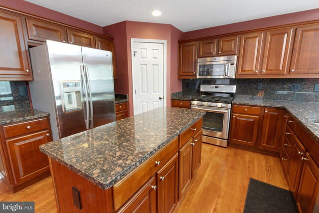 2 Raydan Way N, East, MD 21901 - kitchen featuring appliances with stainless steel finishes, light wood-style floors, backsplash, recessed lighting, and a kitchen island