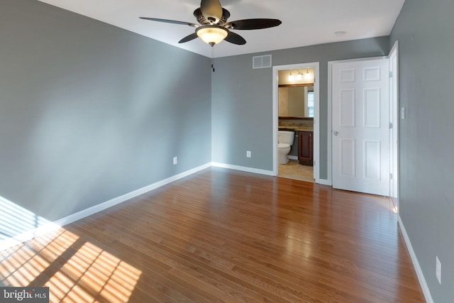 2 Raydan Way N, East, MD 21901 - unfurnished room featuring a ceiling fan, wood finished floors, and baseboards