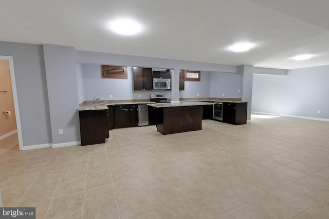 2 Raydan Way N, East, MD 21901 - kitchen with stainless steel appliances, a kitchen island, open floor plan, and baseboards