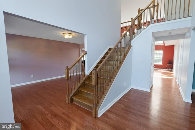 2 Raydan Way N, East, MD 21901 - staircase featuring wood finished floors, baseboards, and a towering ceiling