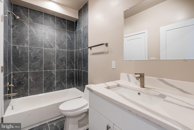 bathroom with toilet, shower / bathtub combination, and vanity