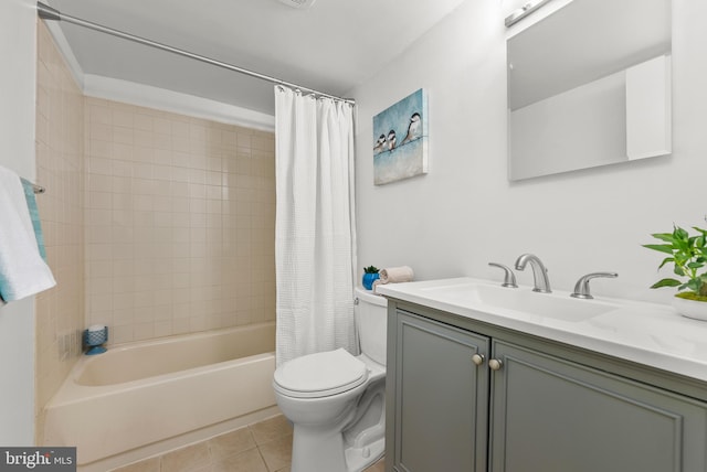 full bathroom featuring tile patterned floors, toilet, vanity, and shower / bathtub combination with curtain