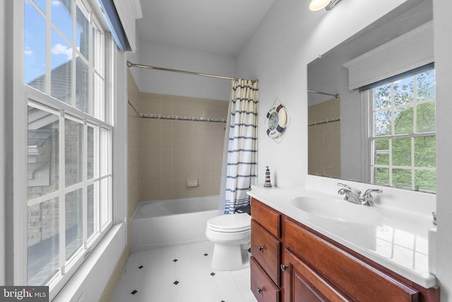 full bath with toilet, tile patterned flooring, shower / bathtub combination with curtain, and vanity