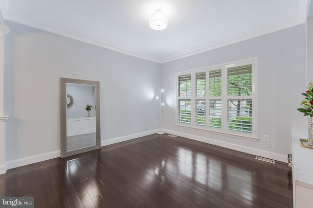 19599 Aspendale Sq, Ashburn, VA 20147 - unfurnished room featuring baseboards, crown molding, wood-type flooring, and decorative columns