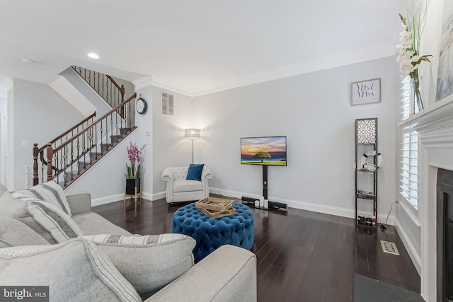 19599 Aspendale Sq, Ashburn, VA 20147 - living area with stairway, baseboards, wood finished floors, a fireplace, and recessed lighting