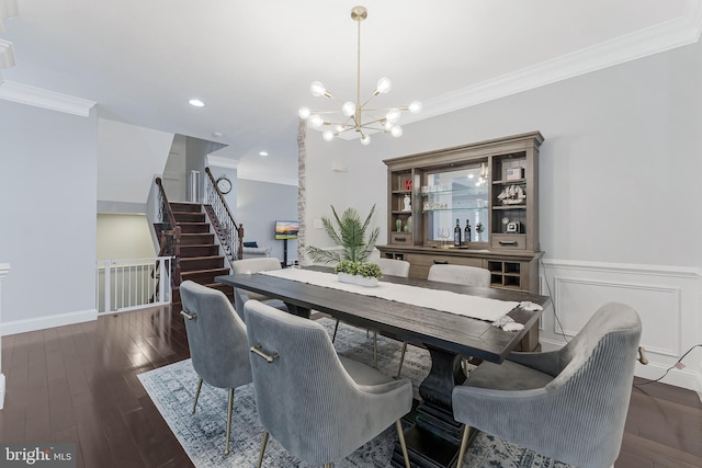 19599 Aspendale Sq, Ashburn, VA 20147 - dining space featuring crown molding, a chandelier, stairway, wood finished floors, and recessed lighting