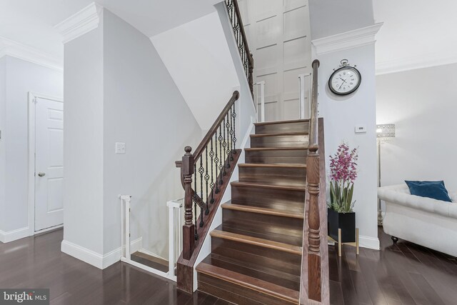 19599 Aspendale Sq, Ashburn, VA 20147 - stairway with wood finished floors, ornamental molding, and baseboards