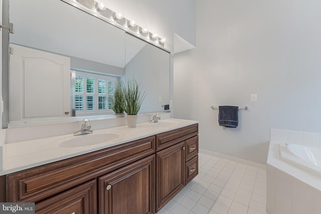 19599 Aspendale Sq, Ashburn, VA 20147 - full bathroom with tile patterned flooring, double vanity, and a garden tub