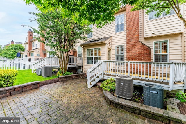 19599 Aspendale Sq, Ashburn, VA 20147 - rear view of property featuring central AC, a patio area, and a wooden deck