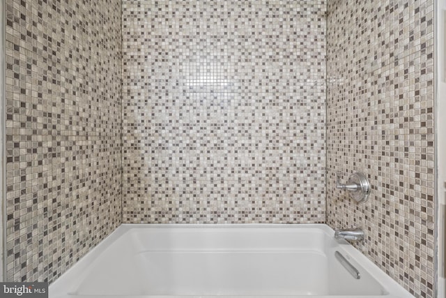 bathroom with shower / bathtub combination