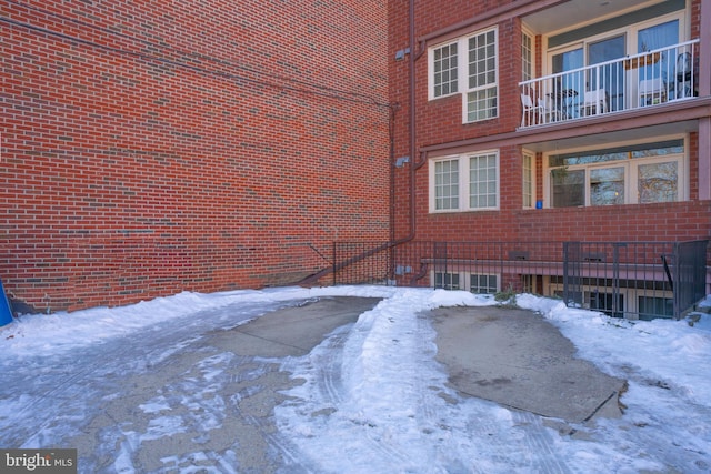5233 Connecticut Ave NW Unit 301, Washington, DC 20015 - snow covered property featuring brick siding