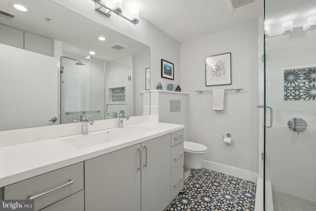 2120 Vermont Ave NW Unit 309, Washington, DC 20001 - bathroom featuring vanity, a shower stall, tile patterned floors, and recessed lighting