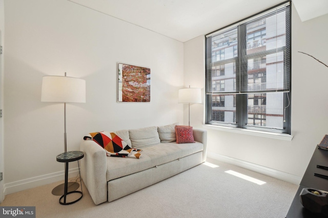 2120 Vermont Ave NW Unit 309, Washington, DC 20001 - carpeted living area featuring baseboards