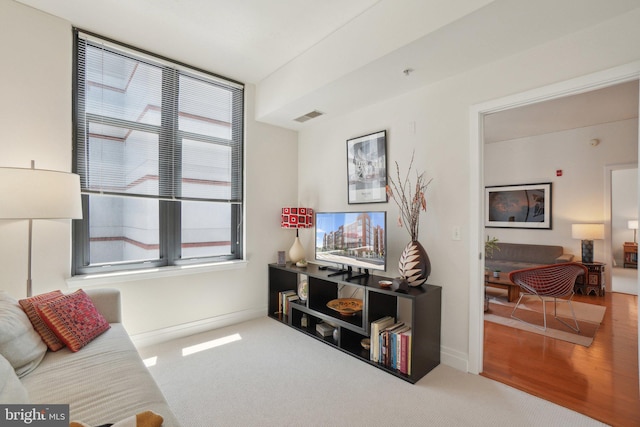 2120 Vermont Ave NW Unit 309, Washington, DC 20001 - carpeted living room featuring healthy amount of natural light