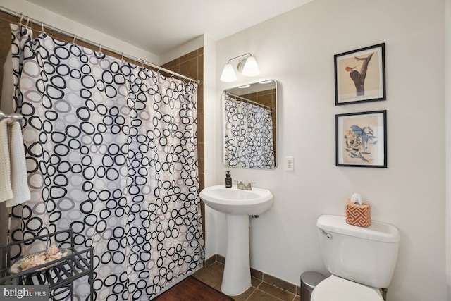 2120 Vermont Ave NW Unit 309, Washington, DC 20001 - bathroom with curtained shower and tile patterned flooring