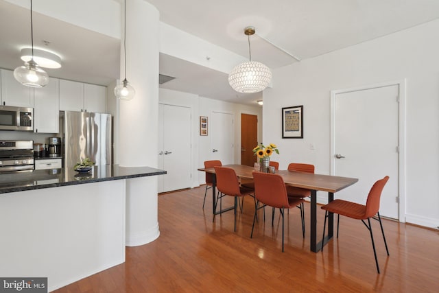 2120 Vermont Ave NW Unit 309, Washington, DC 20001 - dining room featuring dark wood-style floors