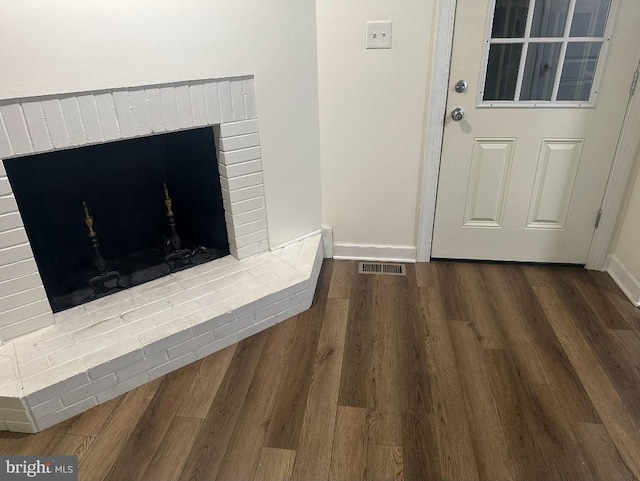 307 Congress Dr, Gibbstown, NJ 08027 - detailed view of a fireplace, baseboards, and wood finished floors