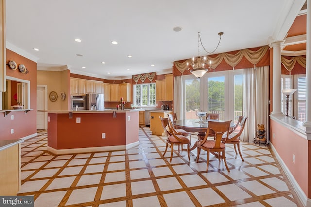 kitchen featuring a center island with sink, baseboards, light countertops, appliances with stainless steel finishes, and recessed lighting