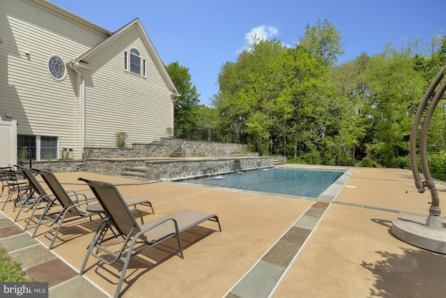 pool featuring a patio