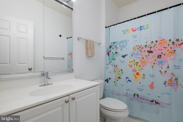 bathroom with toilet, vanity, and a shower with shower curtain