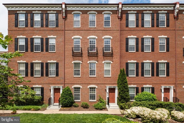 view of front of property with brick siding