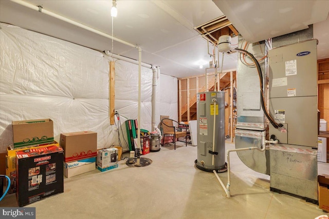 unfinished below grade area with water heater and heating unit