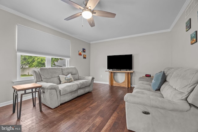 living room featuring crown molding, dark wood-style flooring, a ceiling fan, and baseboards