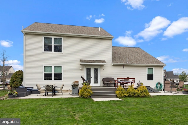 rear view of house featuring outdoor lounge area, a patio area, and roof with shingles